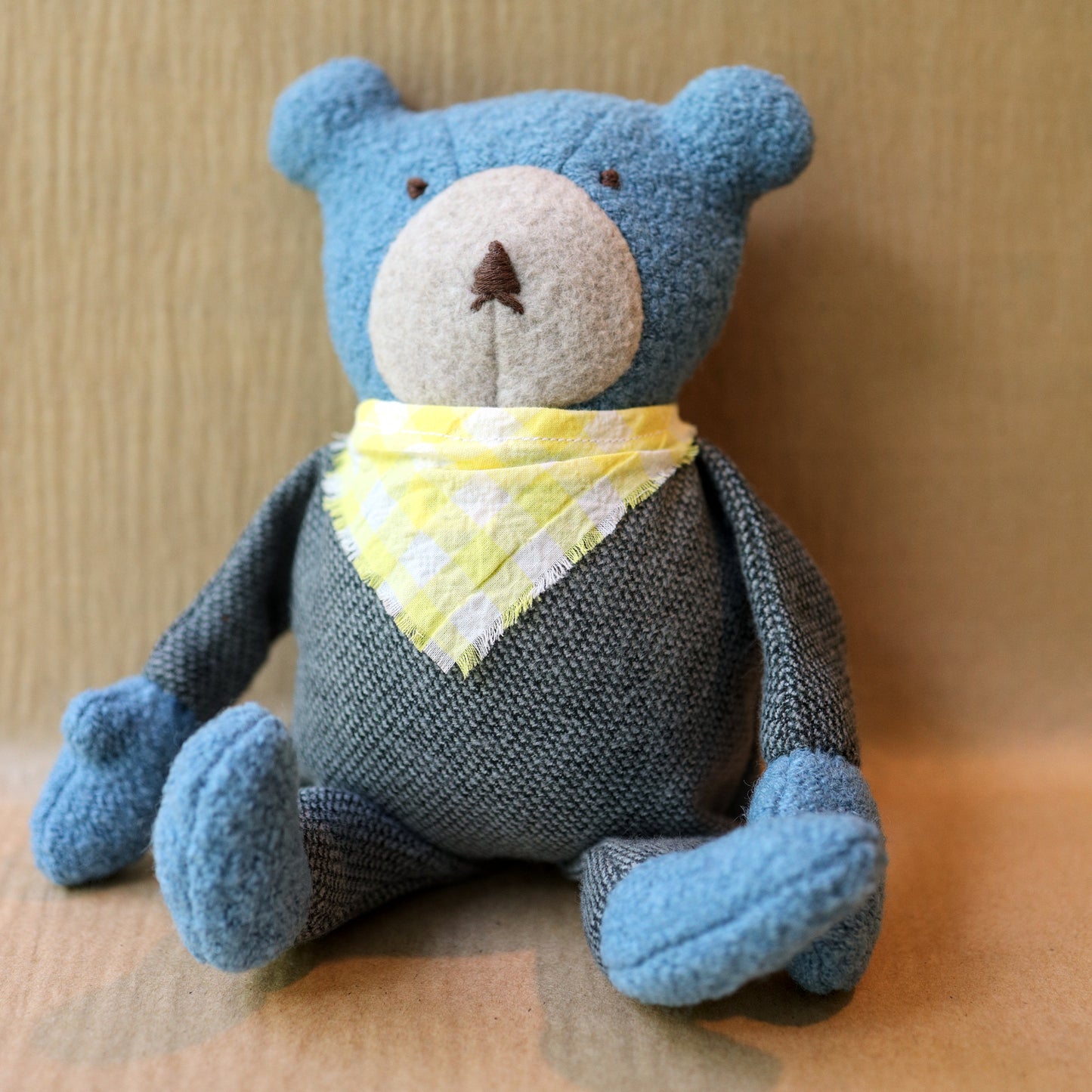 Berry the Floppy Teddy in pepper pajamas and wool boucle