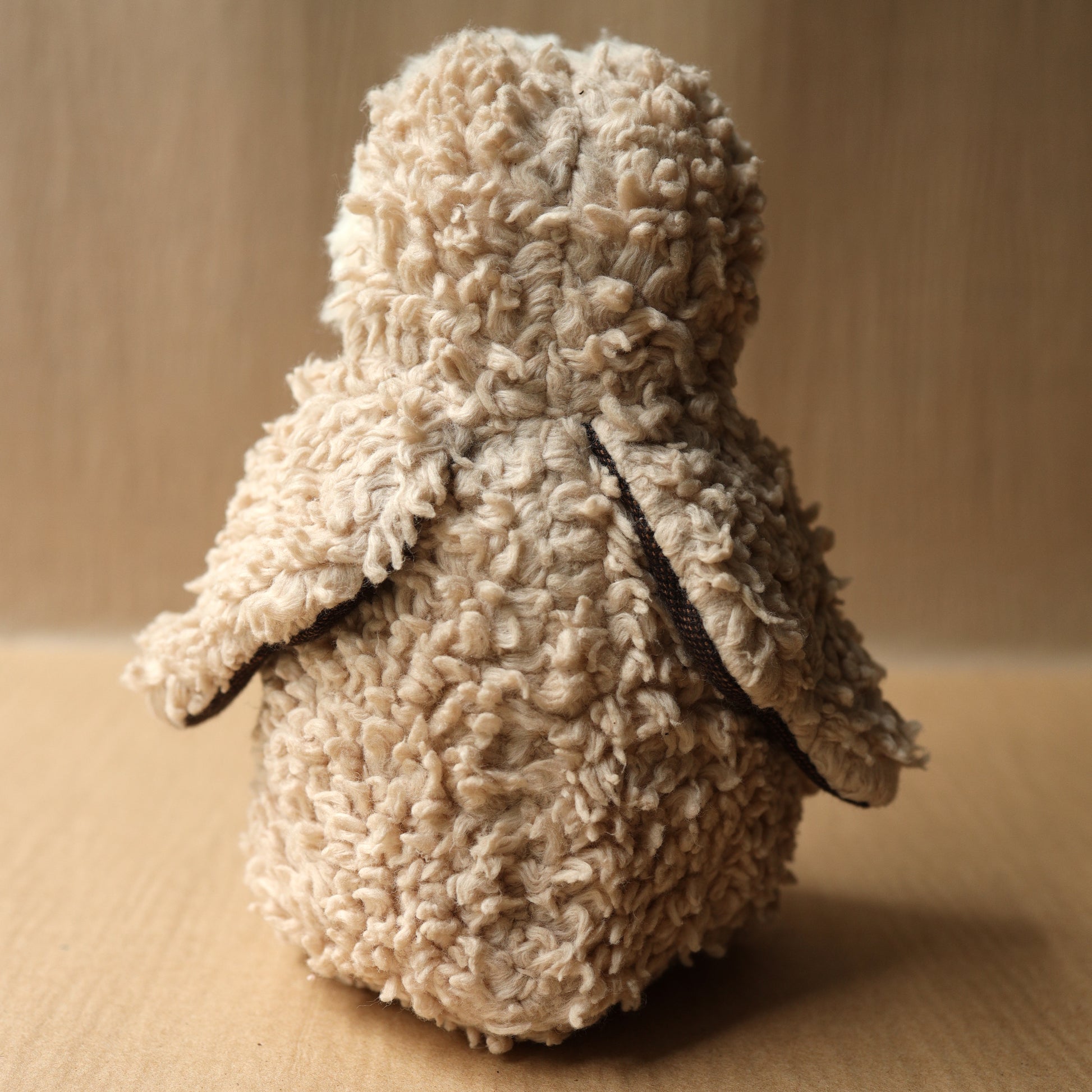 Back of all natural wool cotton and silk owl toy plushie dyed with tea