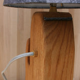 log lamp back, charcoal linen shade, ebonized oak, brass