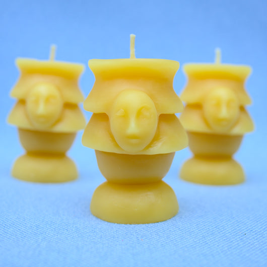 beheaded beeswax candles