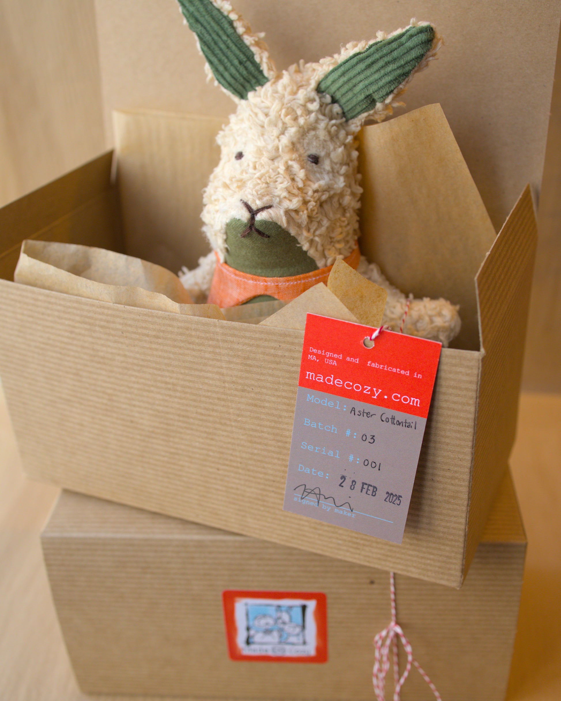 product packaging photo of aster cottontail in green and light brown tea dued fabric with a linen pointy collar