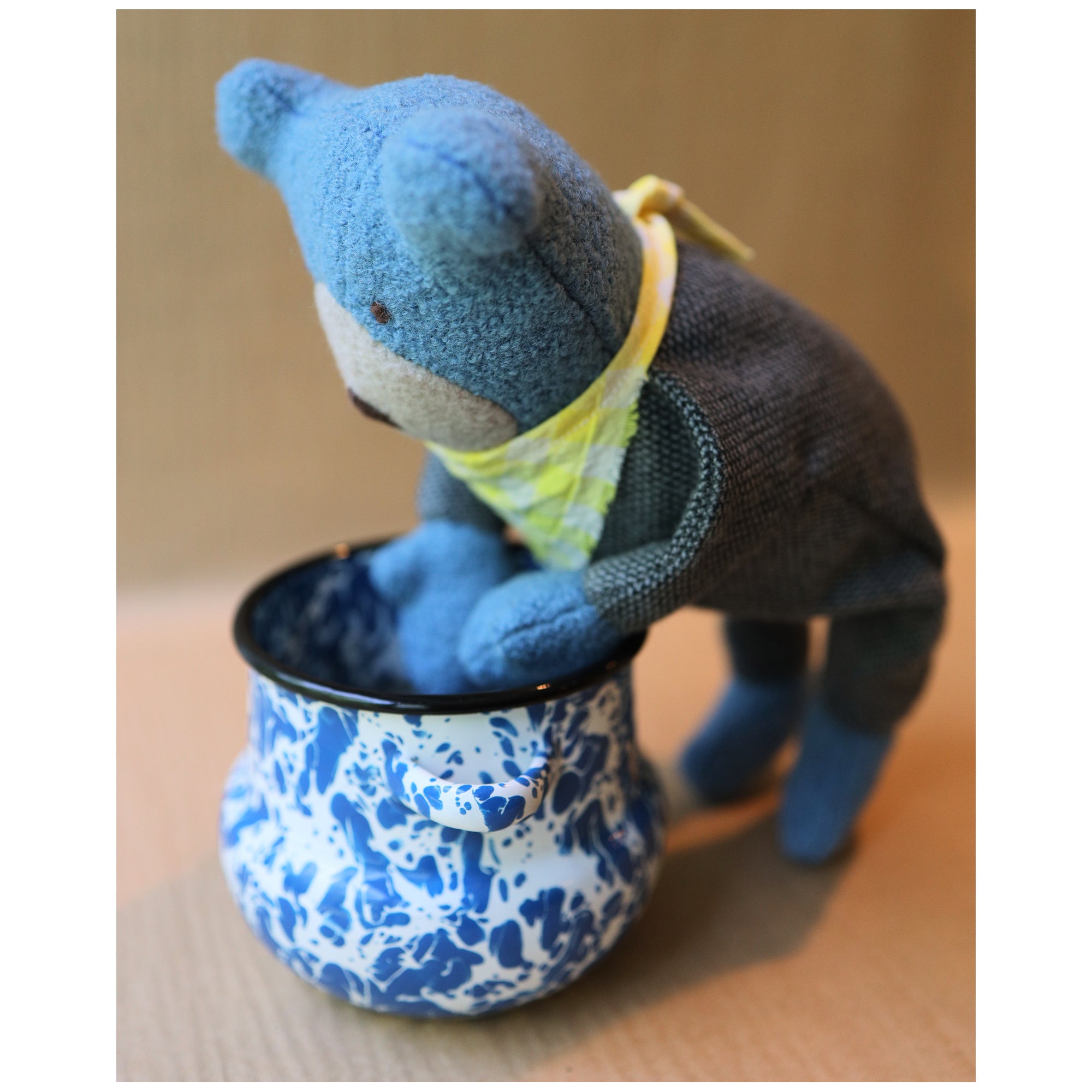 Berry the Floppy Teddy in pepper pajamas and blue wool boucle