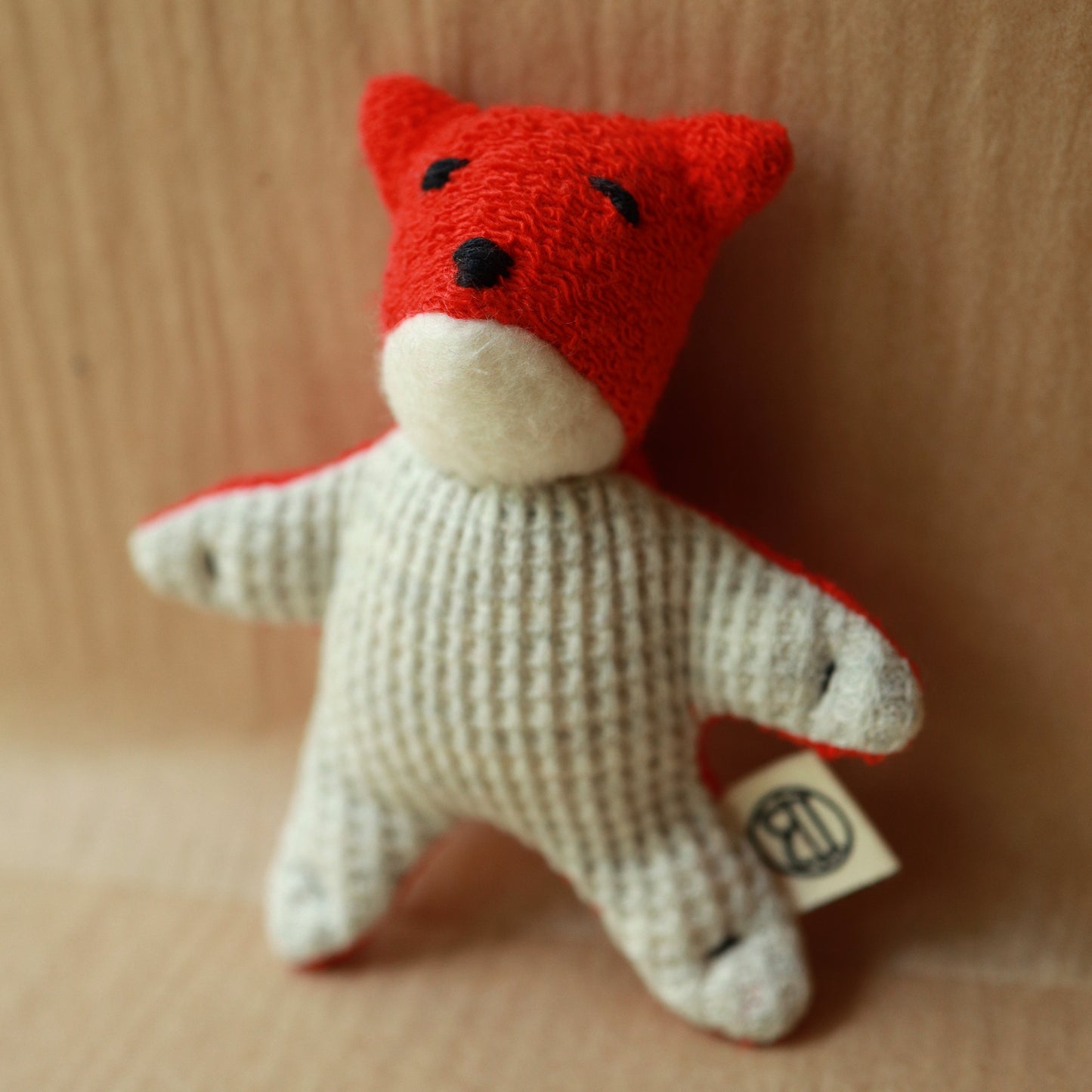 mini fox toy made from red terrycloth, fleece and light gray waffle fabric