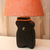 log lamp base, mandarin orange linen shade, ebonized oak, brass