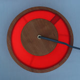 fiery disks lamp waxed sailcloth, red, cherry wood, brass hardware, cloth cord, circle lamp top view