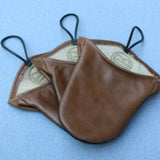 Top of brown leather oven mitt