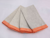 Set of 4 of cloudy gray and mandarin orange bordered linen napkins. Picture frame mitered corner boarder.