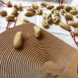 Homamade Pasta board cavatelli, cameo, close up