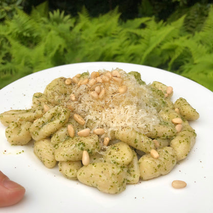 Homemade cavatelli pasta, pesto, cavatelli board